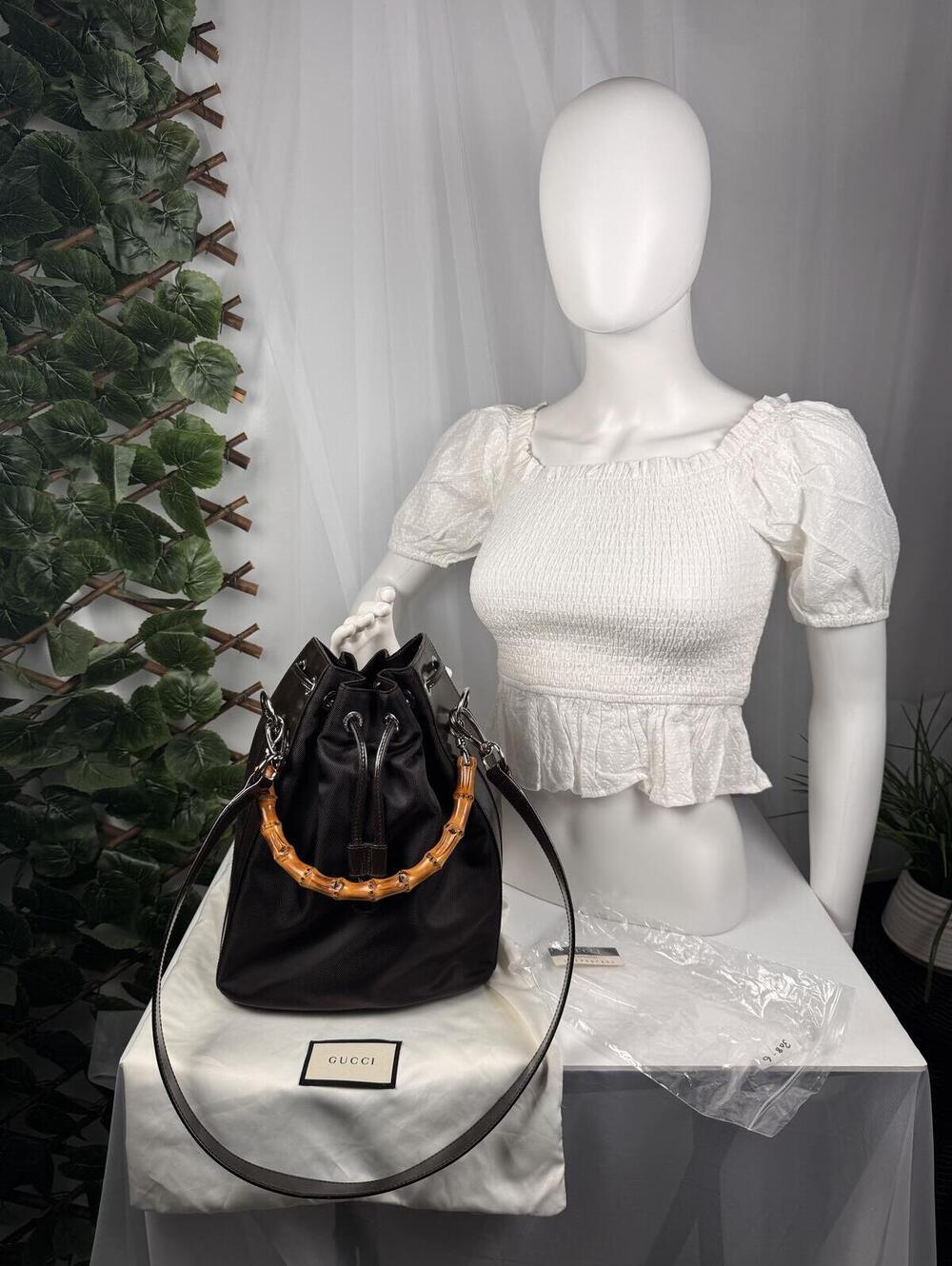 Gucci Black Drawstring Bucket Bag with Bamboo Handle and Shoulder Strap